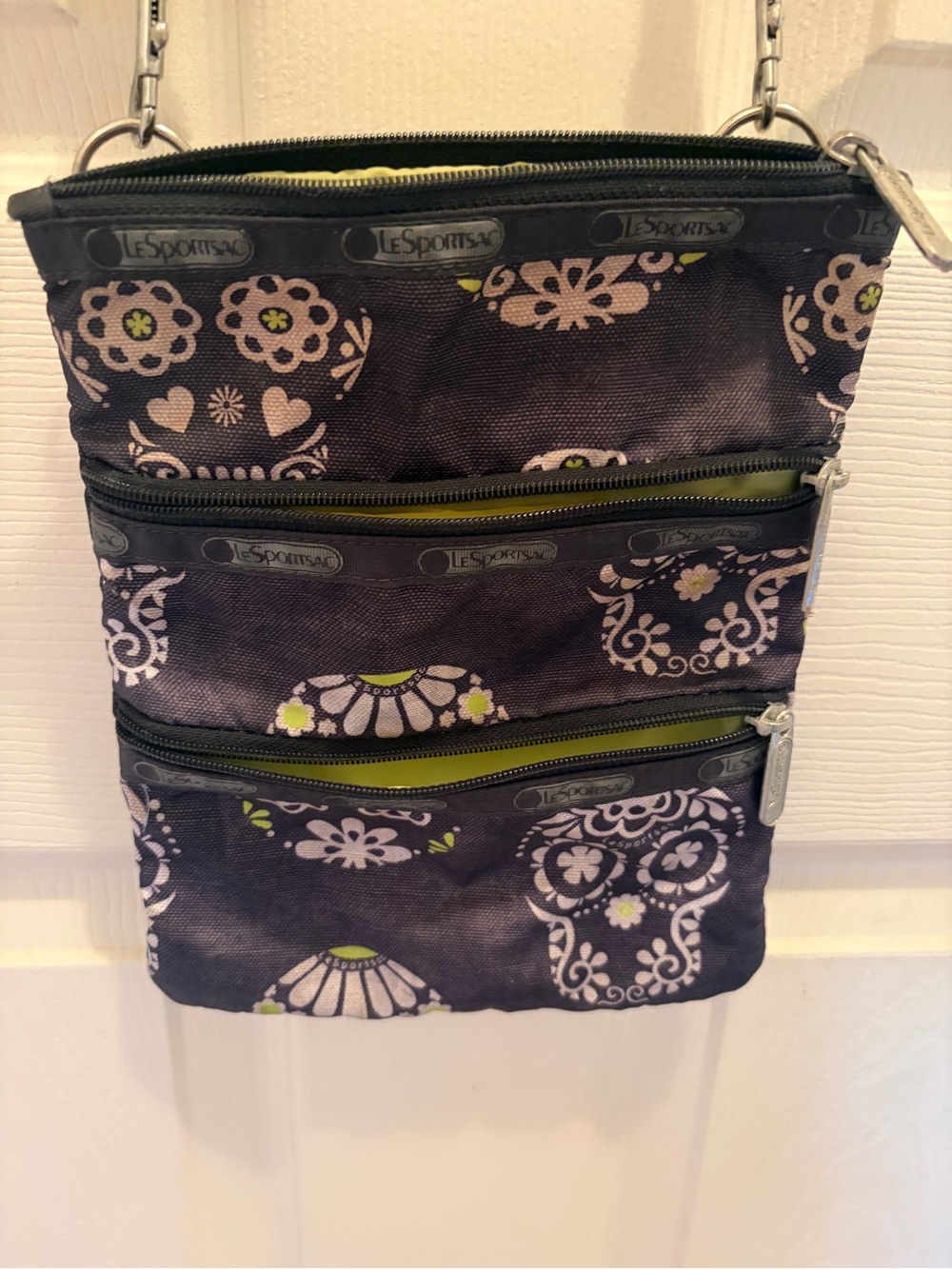 LeSportsac Sugar Skull Crossbody Bag Black Floral 3 Zip 

Strap Lightweight